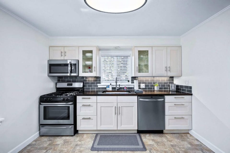 Kitchen or kitchenette, furniture, microwave, oven, stove