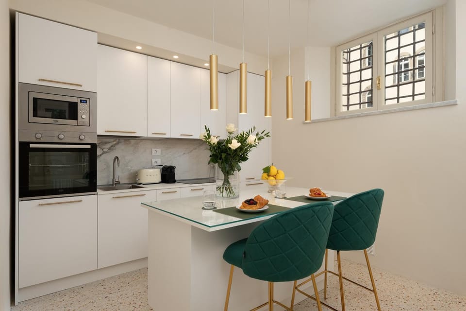 Kitchen or kitchenette, Dining area, dishwasher, oven, stove, toaster
