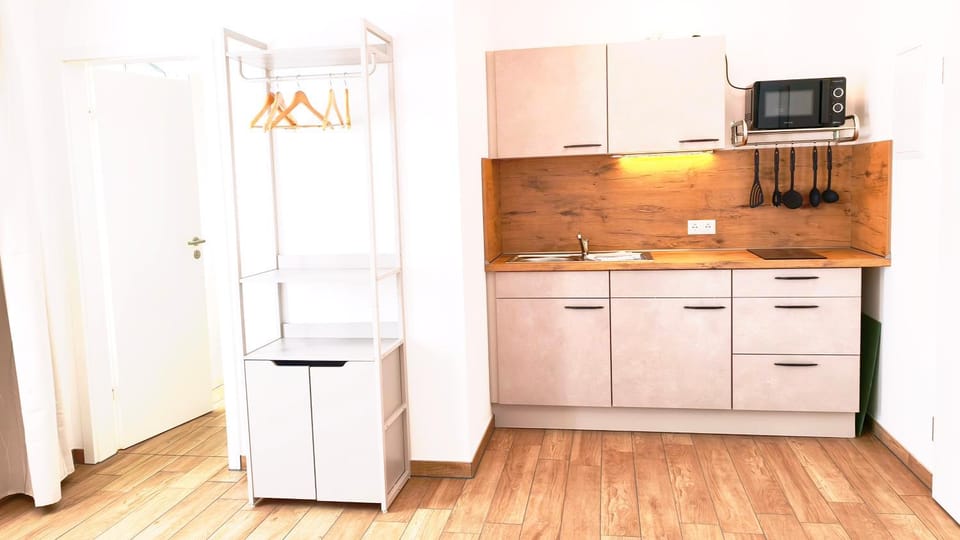 Kitchen or kitchenette, stove