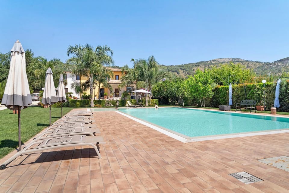 Property building, Living room, Swimming pool