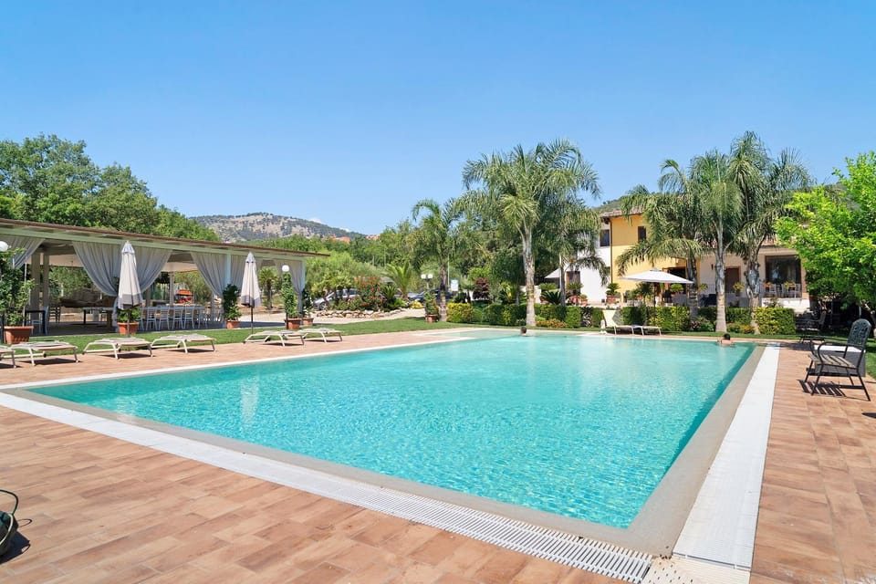 Property building, Living room, Swimming pool