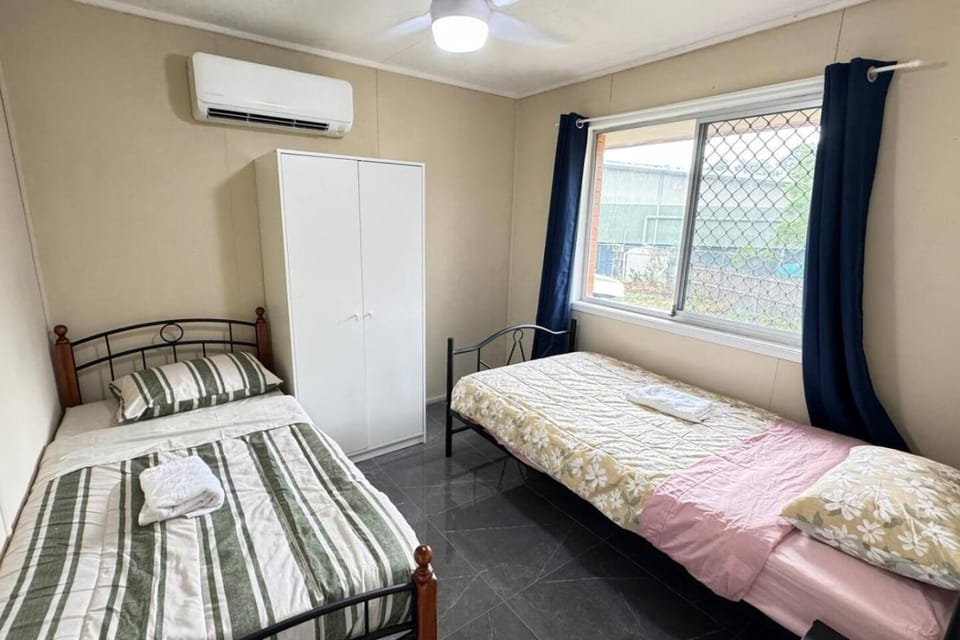 Bed, Photo of the whole room, Bedroom, towels, air conditioner