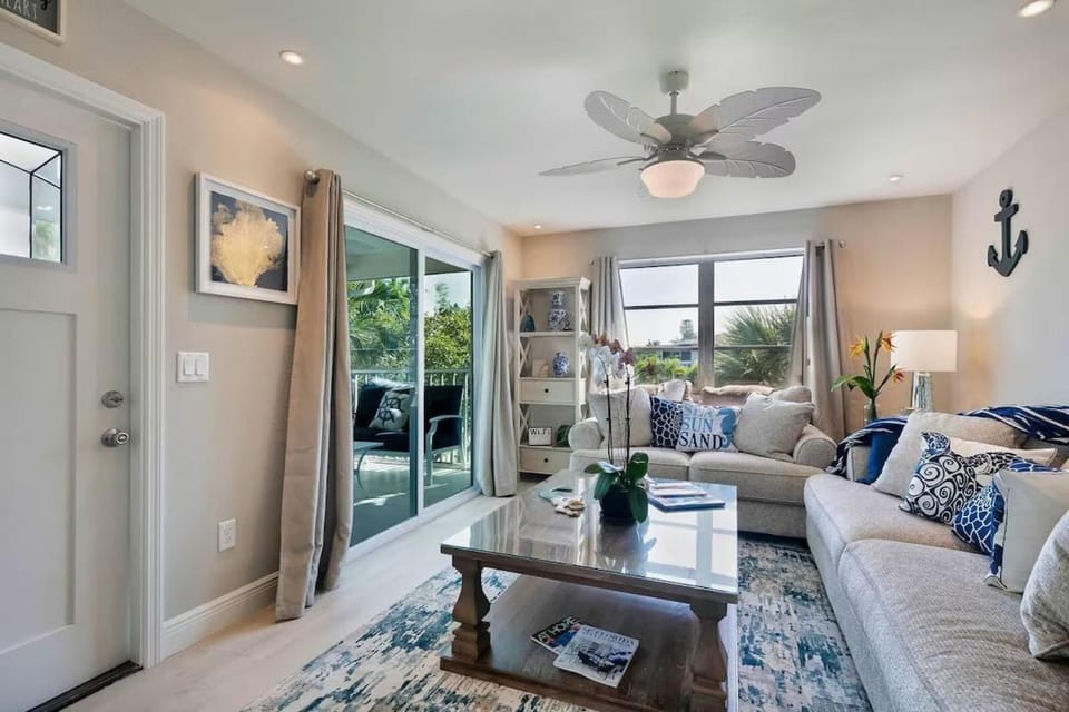 Beachside Canal Retreat with Private Balcony, Island Views & Coastal Charm - The Shore - Roelens House in Estero Island