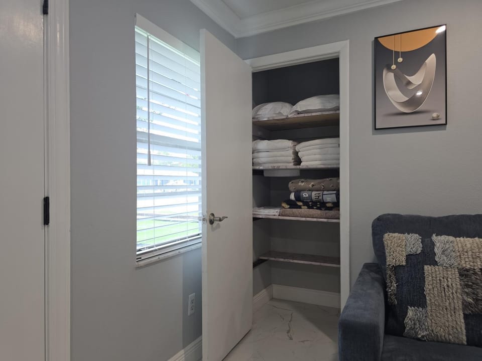 Decorative detail, Seating area, storage, towels, wardrobe