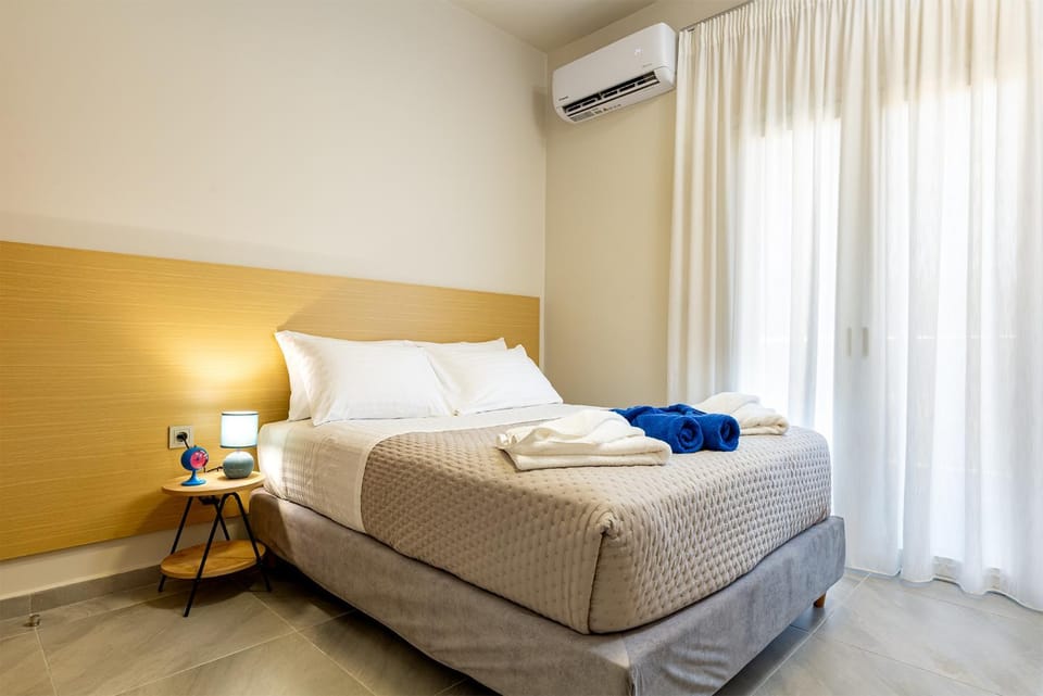 Bed, Photo of the whole room, Bedroom, towels, air conditioner