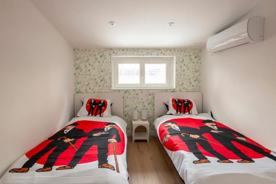 Le Secret de Tintin # Climatisé & Escape Game Apartment in Bourgogne-Franche-Comté