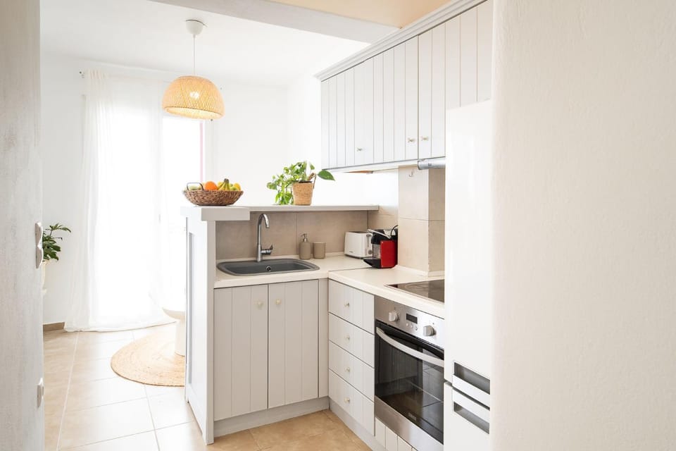 Kitchen or kitchenette, oven, stove