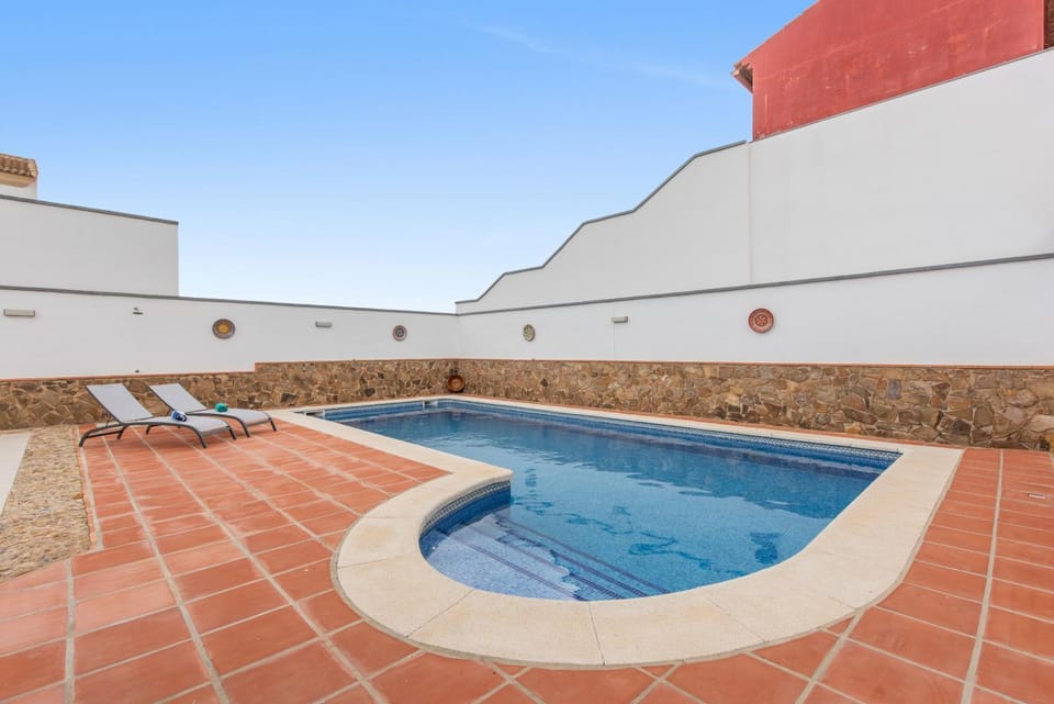 Property building, Living room, Swimming pool