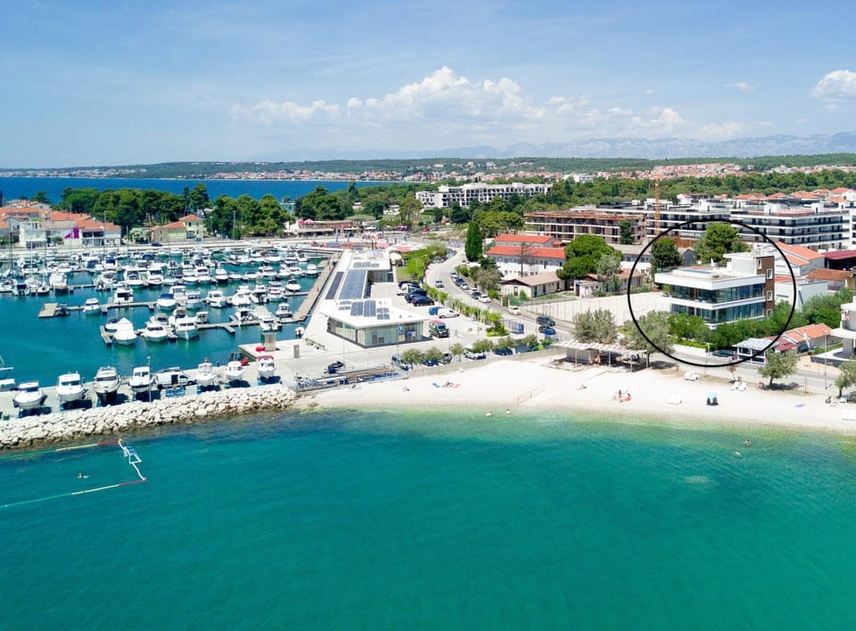 Property building, Day, Bird's eye view, Beach, Location