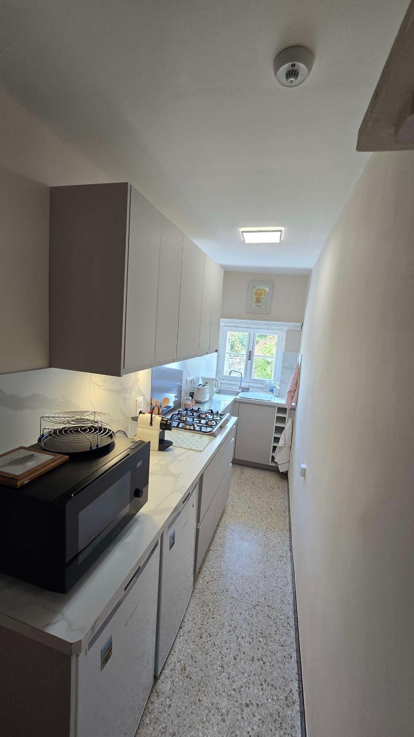 Kitchen or kitchenette, stove