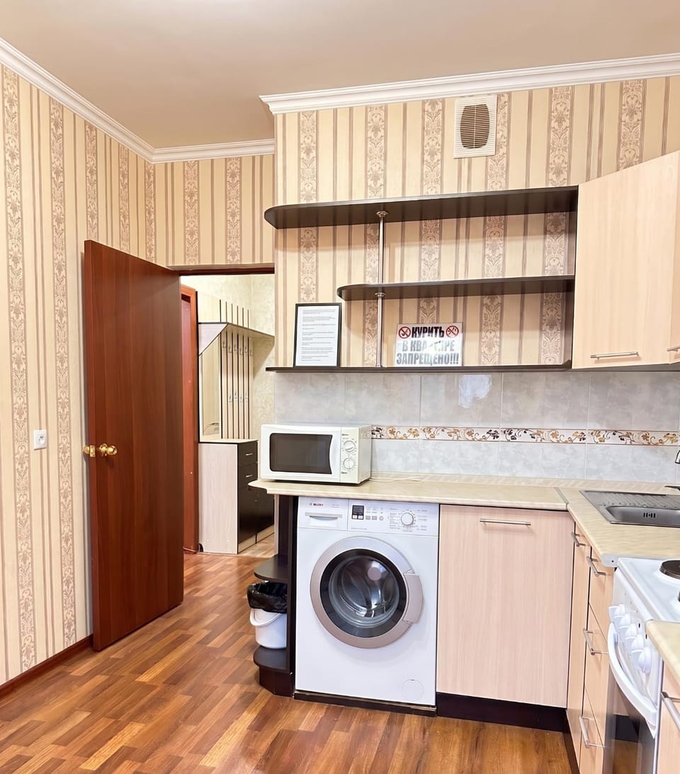 Kitchen or kitchenette, washing machine