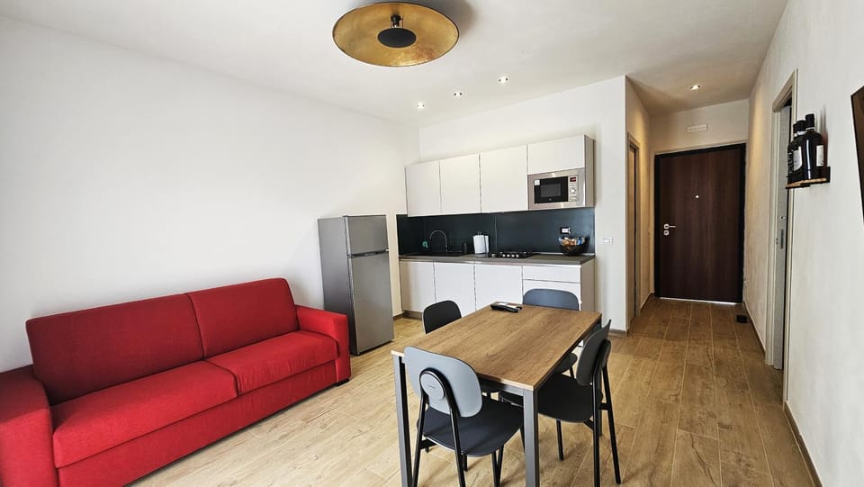 TV and multimedia, Kitchen or kitchenette, Living room, Seating area, Dining area, dishwasher, stove