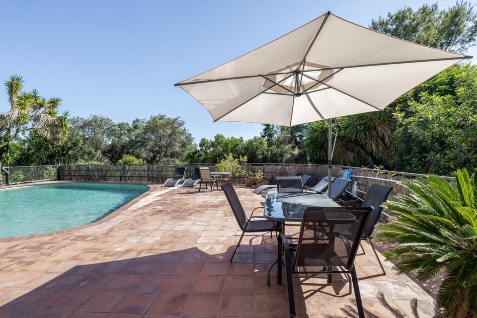Property building, Living room, Swimming pool