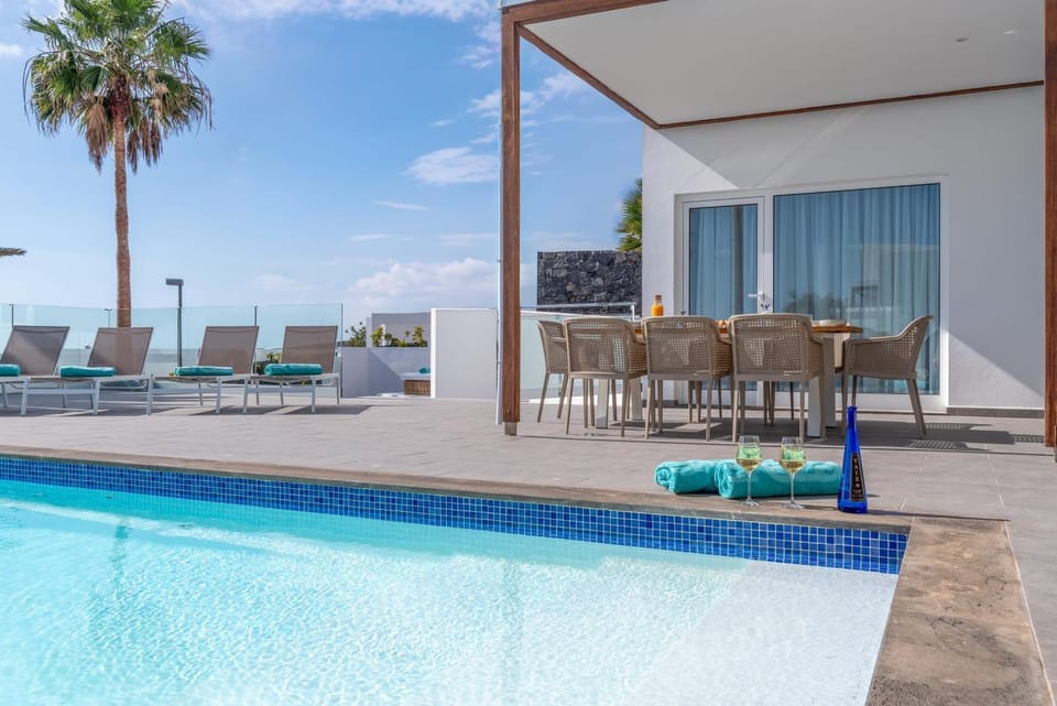 Property building, Living room, Swimming pool