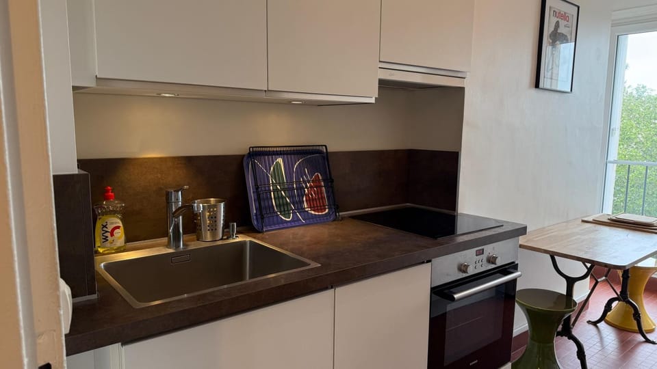 Kitchen or kitchenette, stove, kitchen