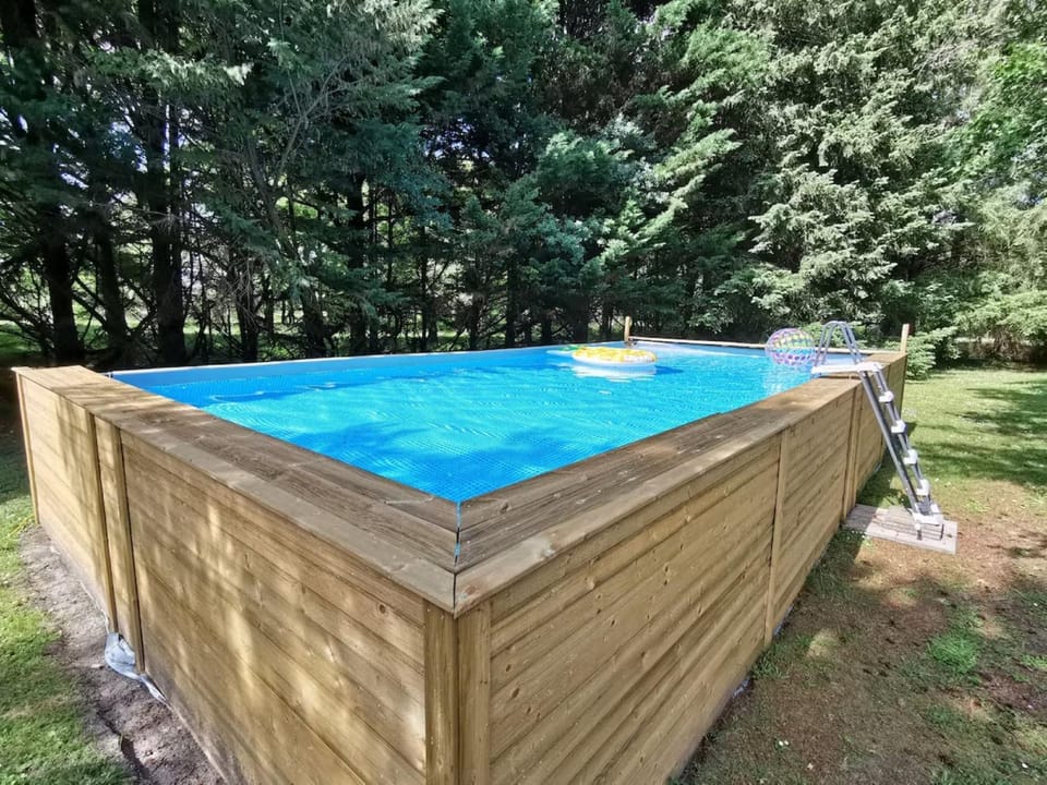 Property building, Living room, Swimming pool