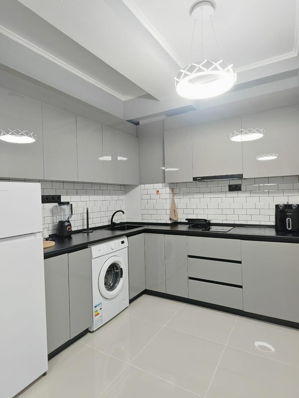 Kitchen or kitchenette, stove, washing machine, kitchen