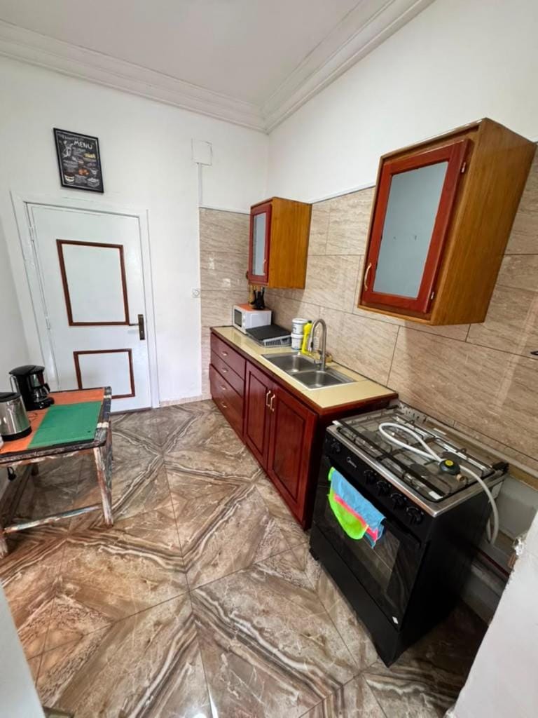 Kitchen or kitchenette, oven, stove