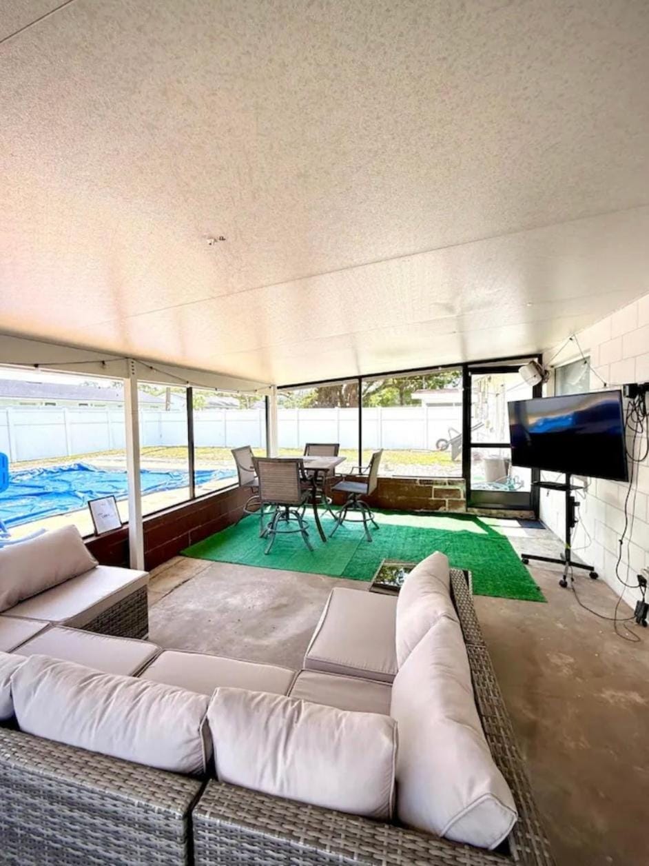 Patio, TV and multimedia, Seating area, Dining area, Pool view