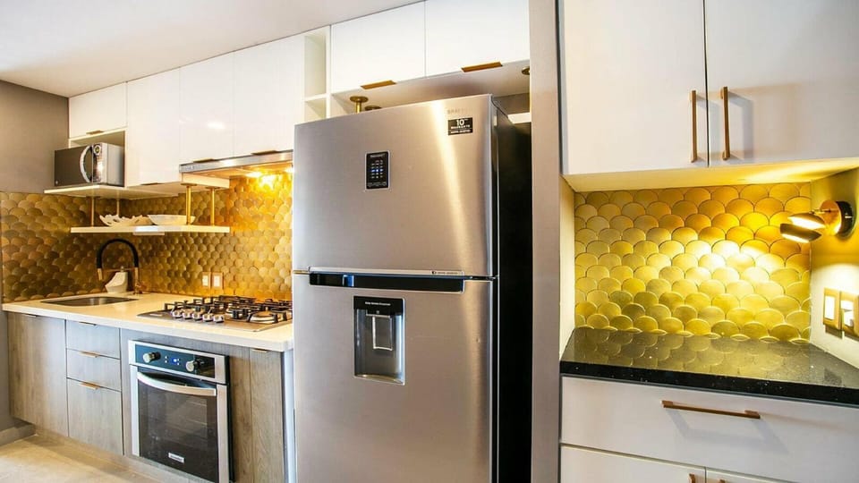 Kitchen or kitchenette, oven