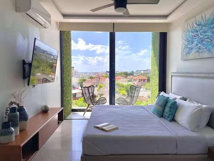 Bed, TV and multimedia, View (from property/room), Balcony/Terrace, Photo of the whole room, Bedroom, air conditioner