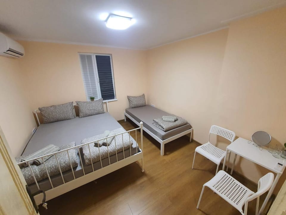 Bed, Living room, Seating area, Bedroom, air conditioner