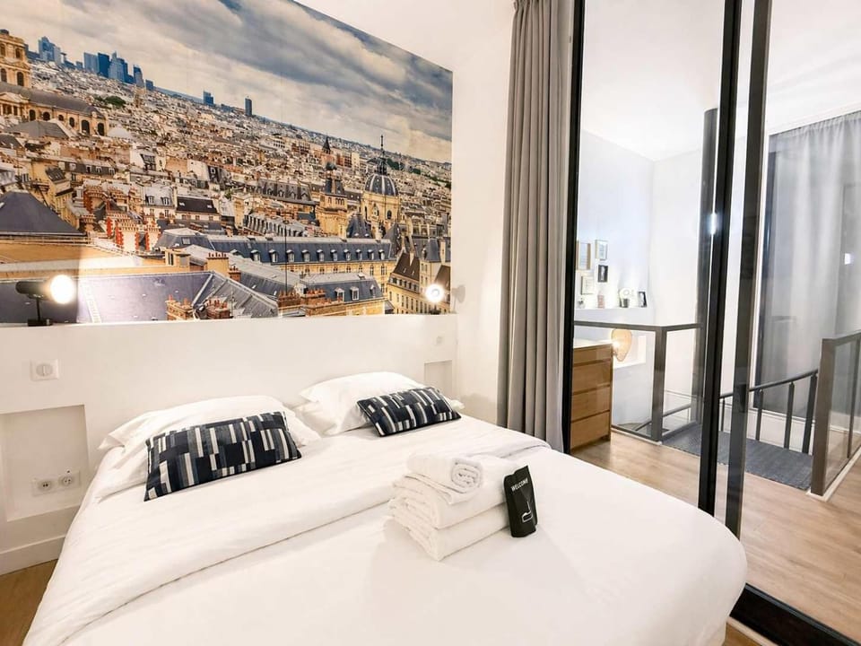 Duplex design avec babyfoot - Montparnasse - 6p Apartment in Paris