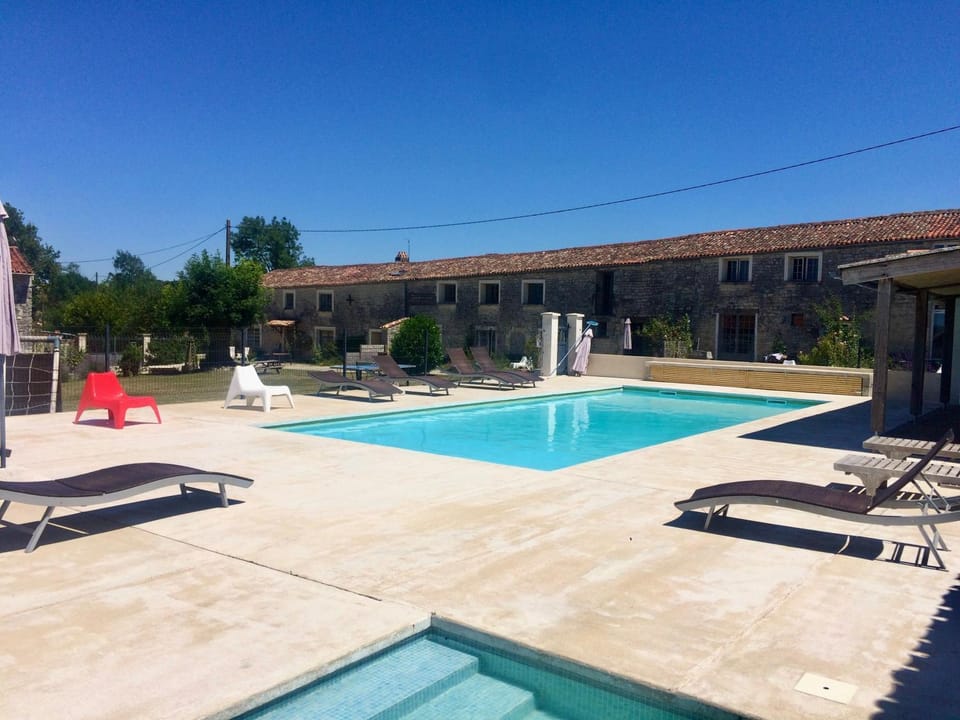 Property building, Living room, Swimming pool