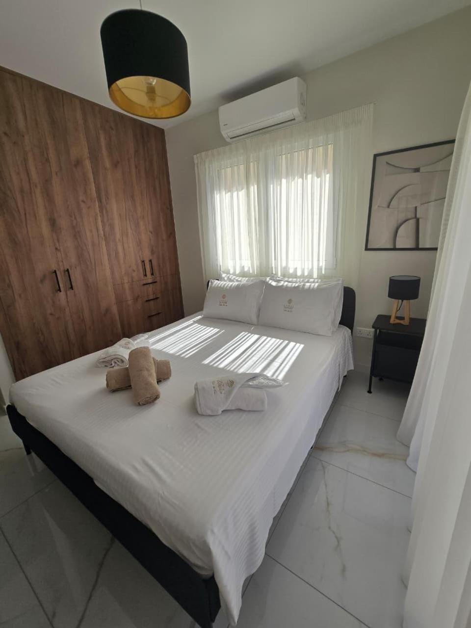 Bed, Photo of the whole room, Bedroom, towels, air conditioner