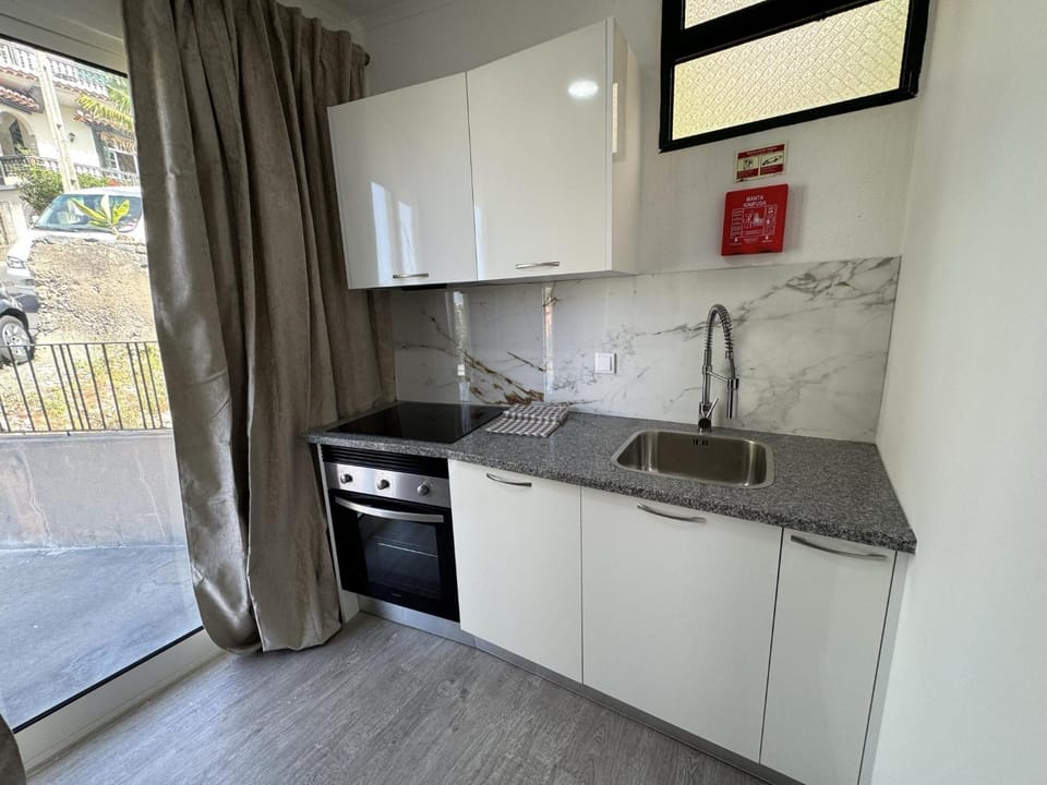 Kitchen or kitchenette, stove