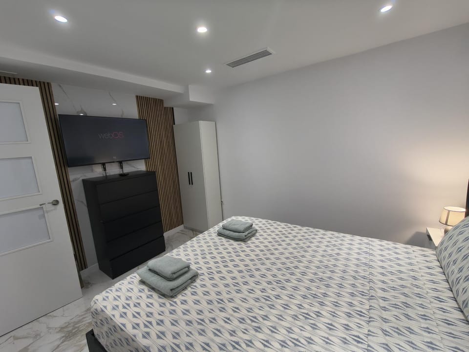 Bed, Photo of the whole room, Bedroom, towels, wardrobe