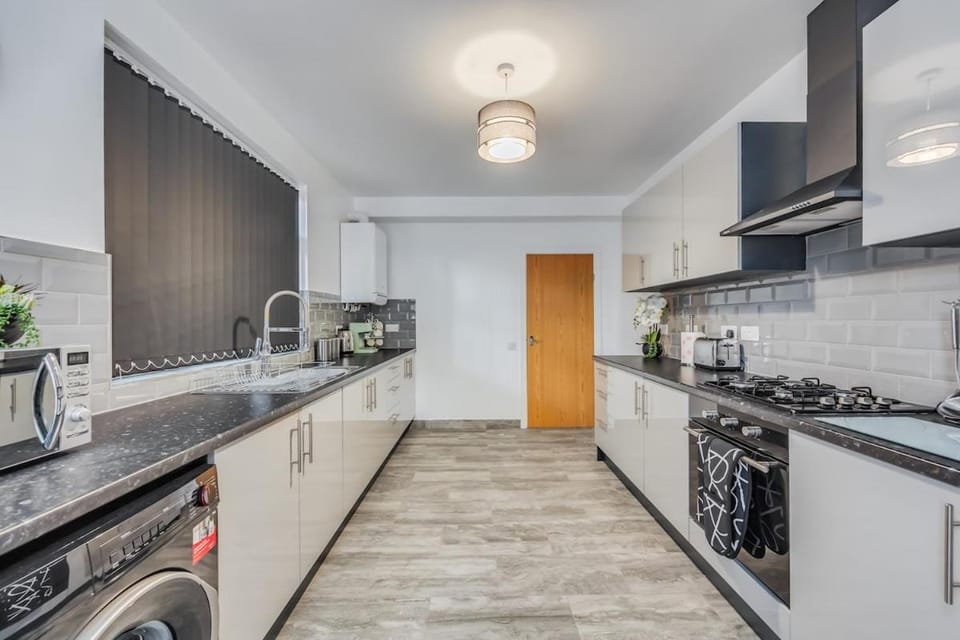 Kitchen or kitchenette, oven, toaster