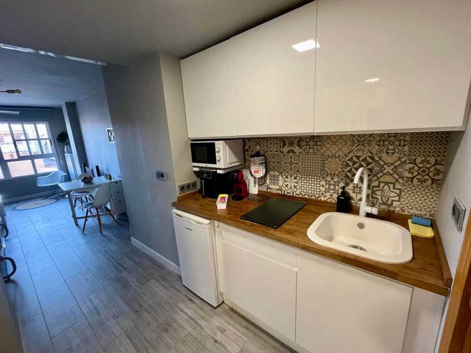 Kitchen or kitchenette, stove