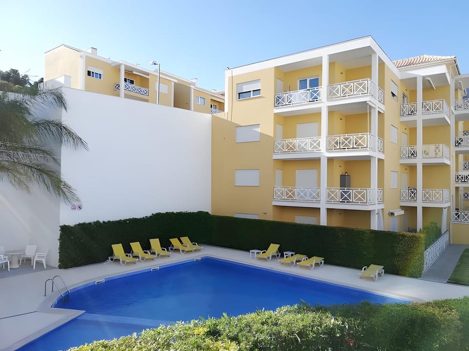 Property building, Living room, Swimming pool