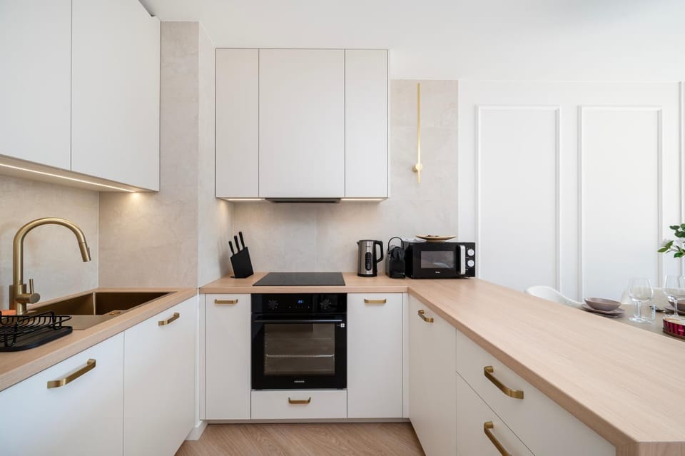 Kitchen or kitchenette, dishwasher, microwave, oven, stove, kitchen