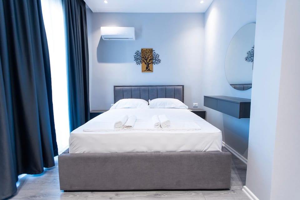 Bed, Photo of the whole room, Bedroom, towels, air conditioner