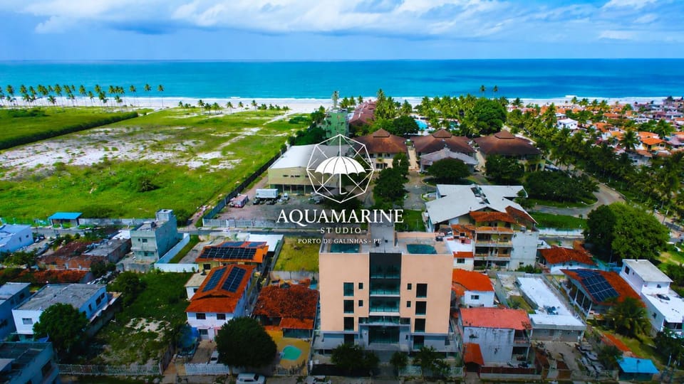 Property building, Nearby landmark, Day, Neighbourhood, Natural landscape, Bird's eye view, Beach, City view, Sea view, Street view, Location