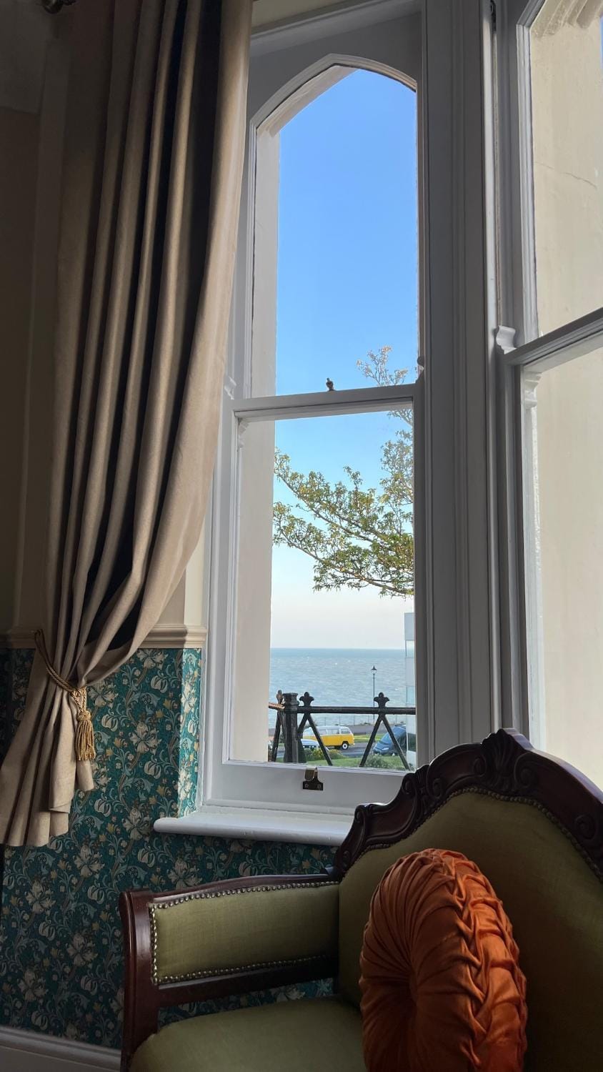 View (from property/room), Living room, Seating area, Sea view