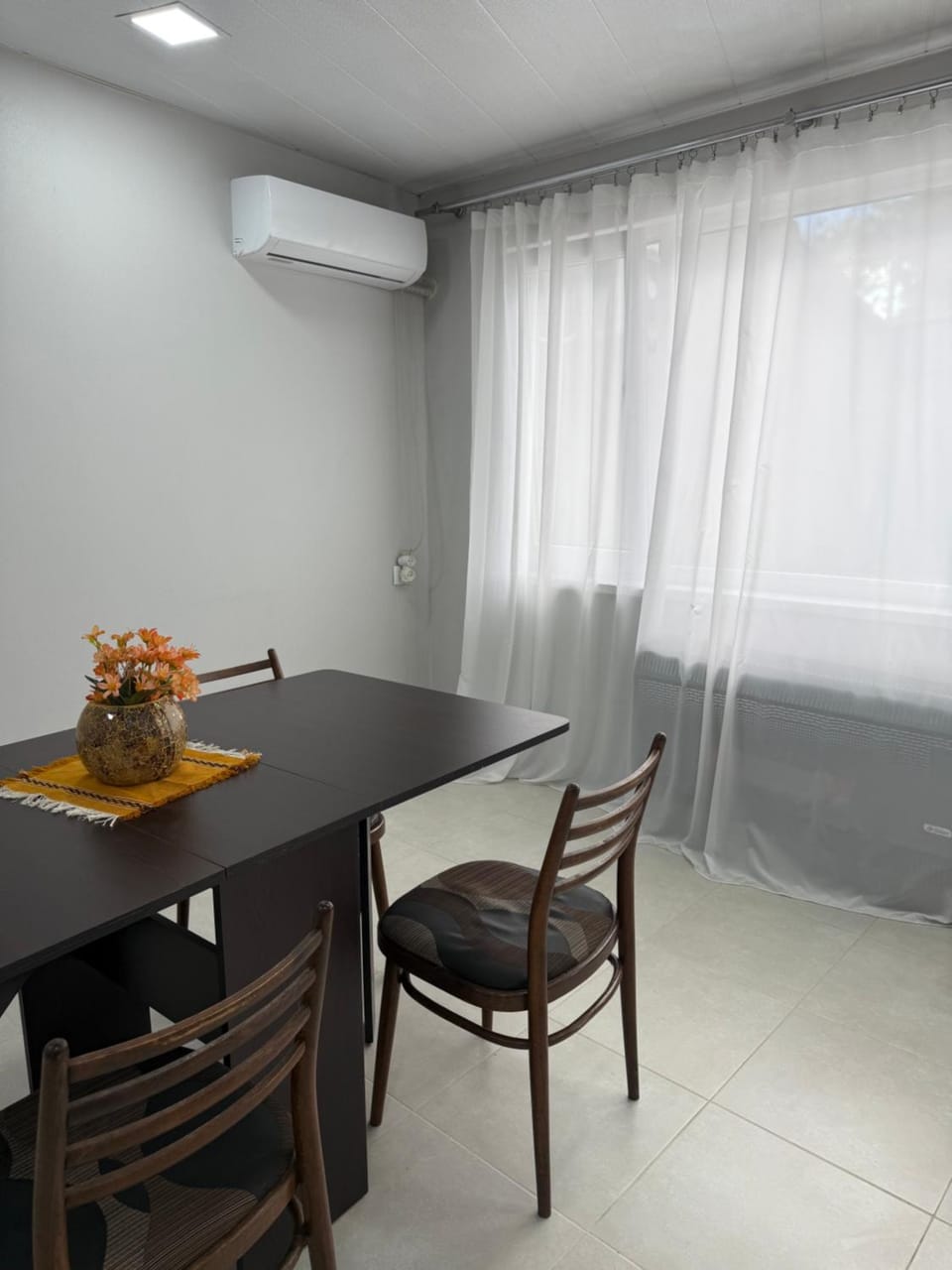 Living room, Seating area, Dining area, air conditioner