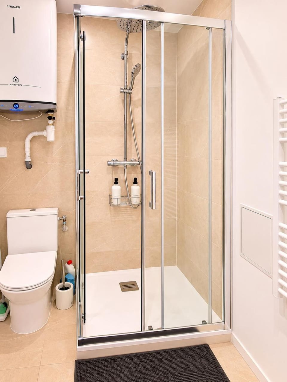 Shower, Toilet, Bathroom, hair dryier, towels