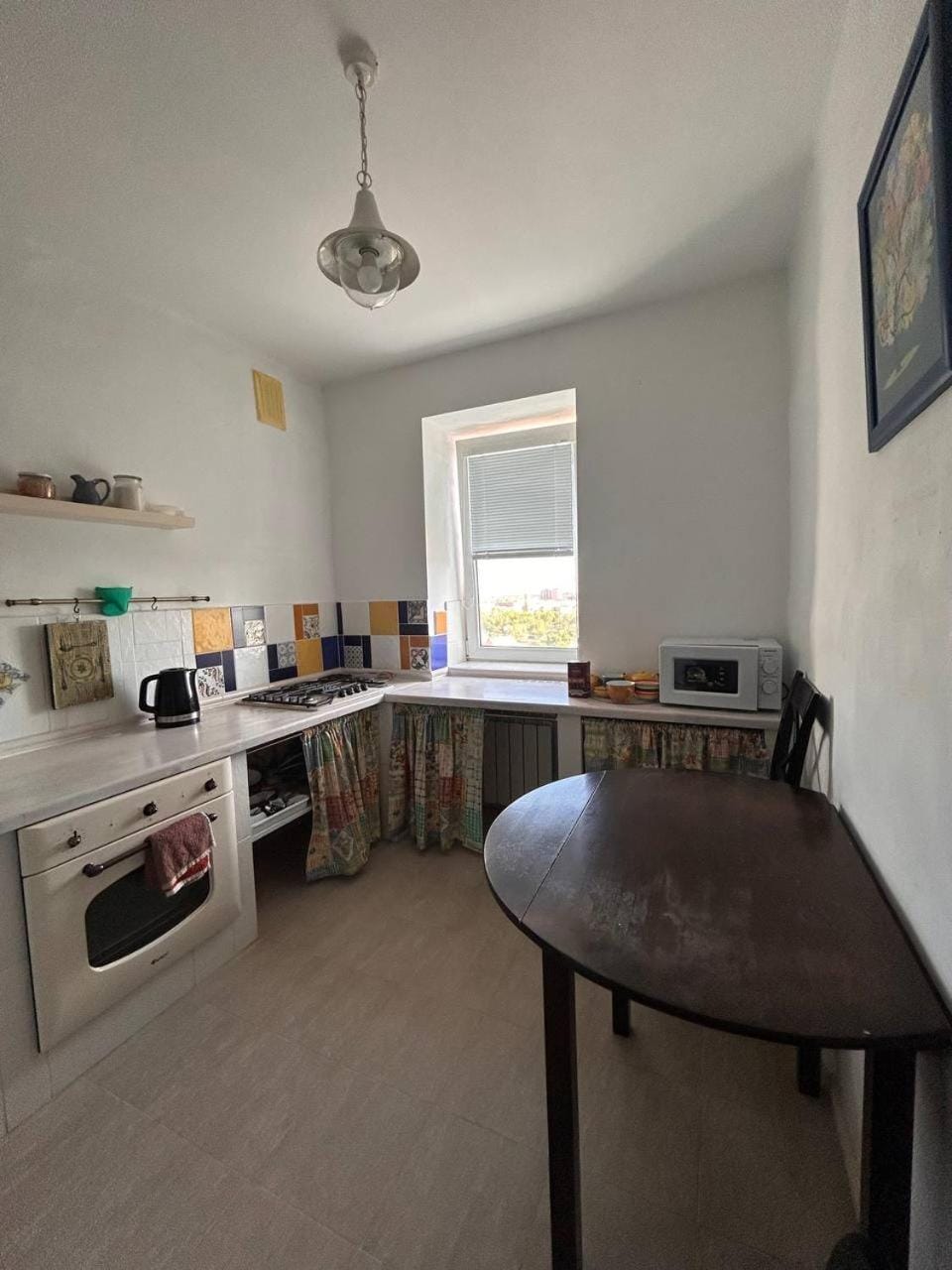 Kitchen or kitchenette, microwave