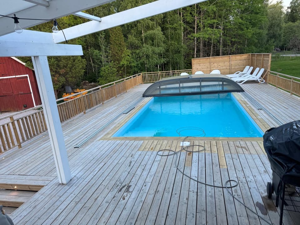 large house with pool in Småland near river Villa in Sweden