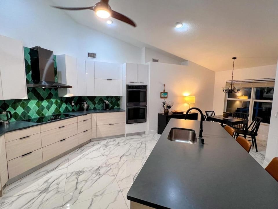 Modern 3-bedroom waterfront pool home in Manatee Bay with boat slip included House in St James City