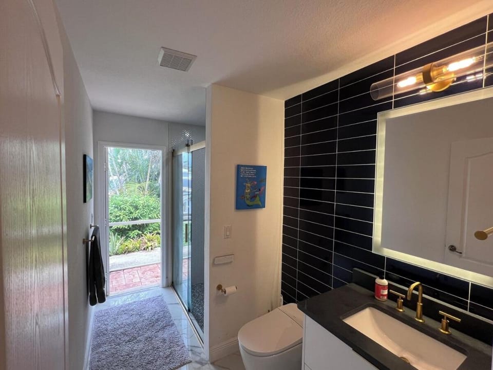 Modern 3-bedroom waterfront pool home in Manatee Bay with boat slip included House in St James City