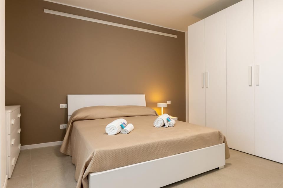 Bed, Bedroom, heating, towels, wardrobe, air conditioner