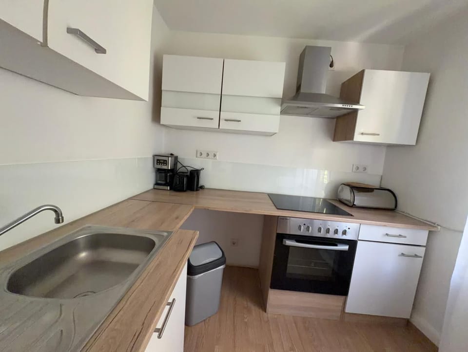 Kitchen or kitchenette, stove, toaster