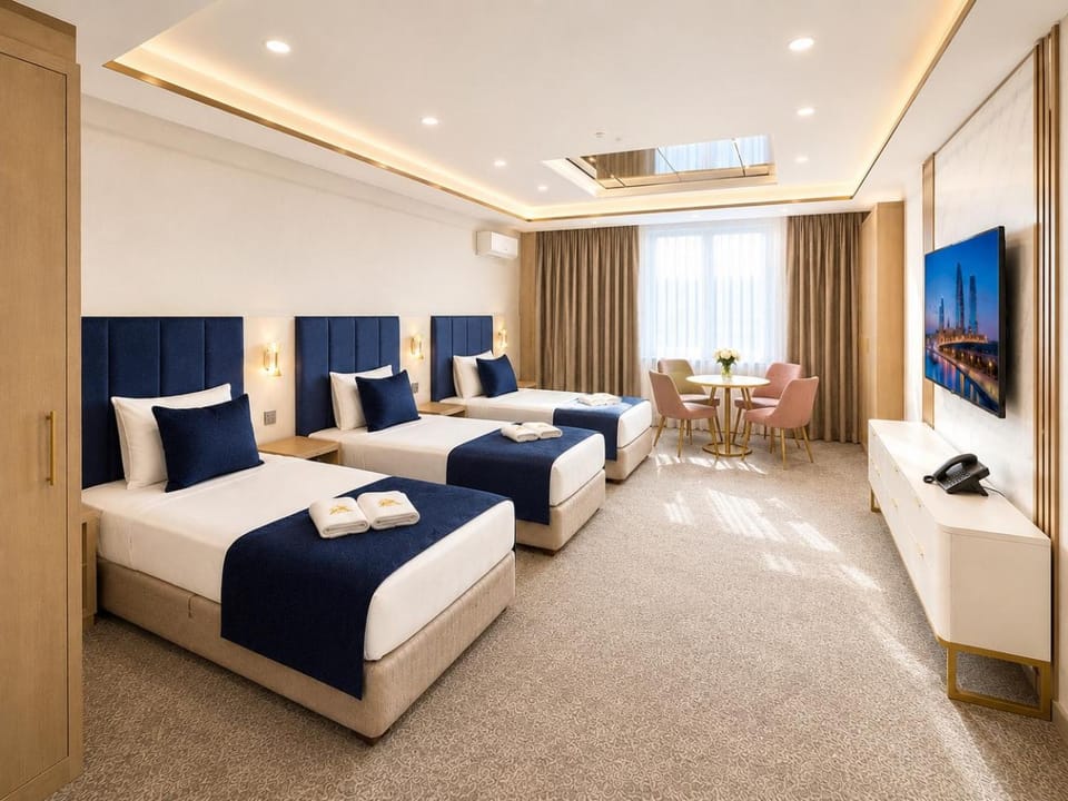 TV and multimedia, Coffee/tea facilities, Living room, Photo of the whole room, Bedroom, minibar, wardrobe, air conditioner