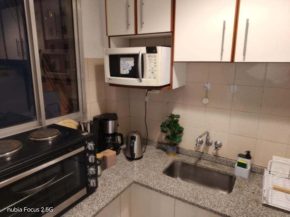 Kitchen or kitchenette, oven