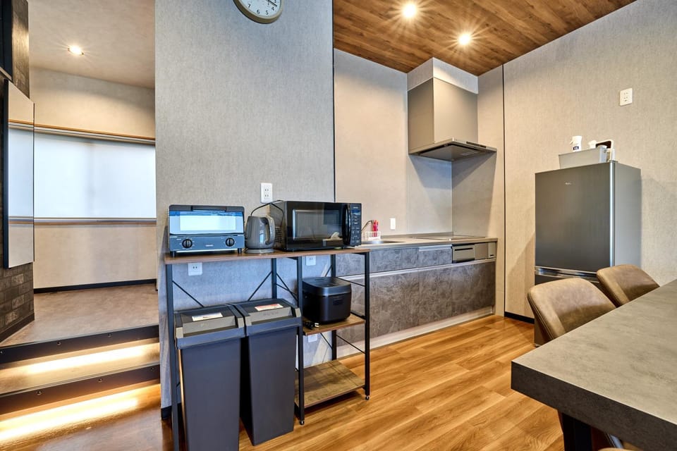 Kitchen or kitchenette, oven, stove, toaster