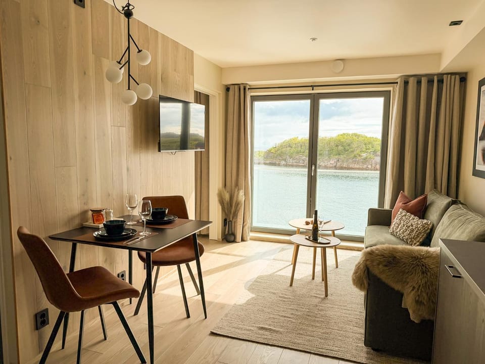 Natural landscape, View (from property/room), Living room, Seating area, Dining area